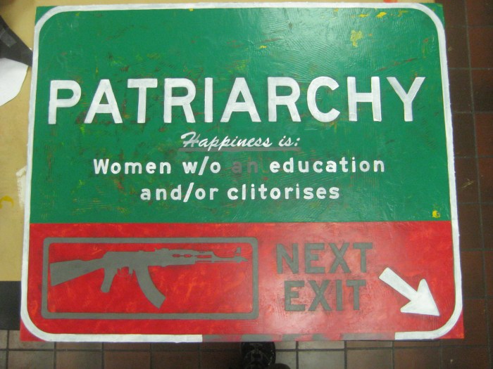 A seemingly better, or at least more unified, composition due to the "reflective" edge, here painted white.  I left the sporaticaly painted section on the bottom alone because it seemed like a fitting allusion to bullets being fired out of the gun.